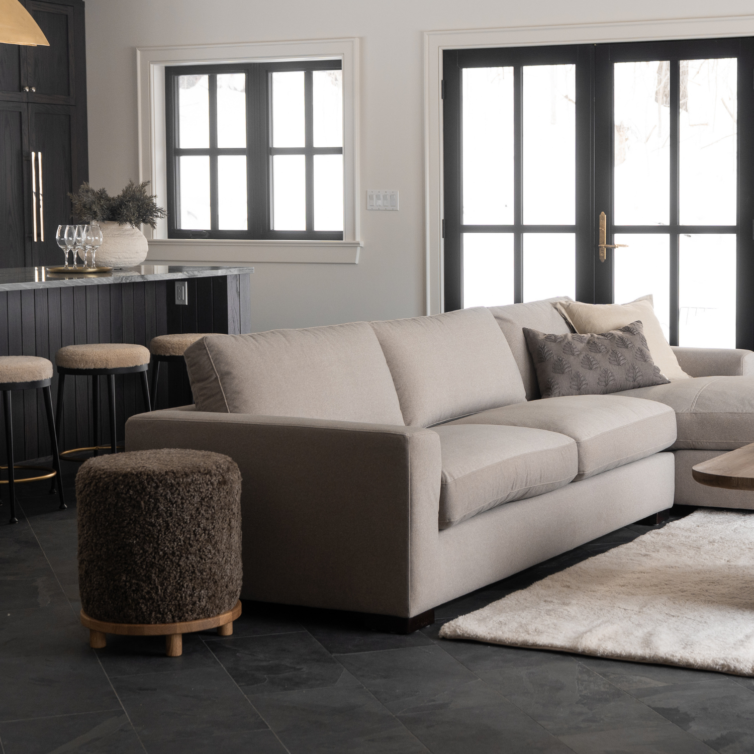 Wool Sheepskin Round Ottoman in Taupe - Solid Oak Base